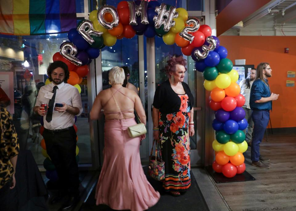 Laci Marie Basel, 75, of Livonia, center right, looks around after handing out all her roses to the beautiful people attending Prom ReDeux at Affirmations Detroit in Ferndale, Mich. on Saturday, June 24, 2023. ÒProm ReDeuxÓ  provides a safe space to reclaim their right of passage, Prom, hosted by Affirmations Detroit. 