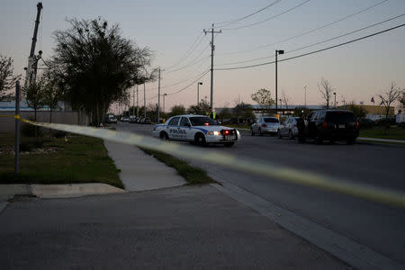 Schertz Police block off Doerr Lane near the scene of a blast at a FedEx facility in Schertz, Texas, U.S., March 20, 2018. REUTERS/Sergio Flores