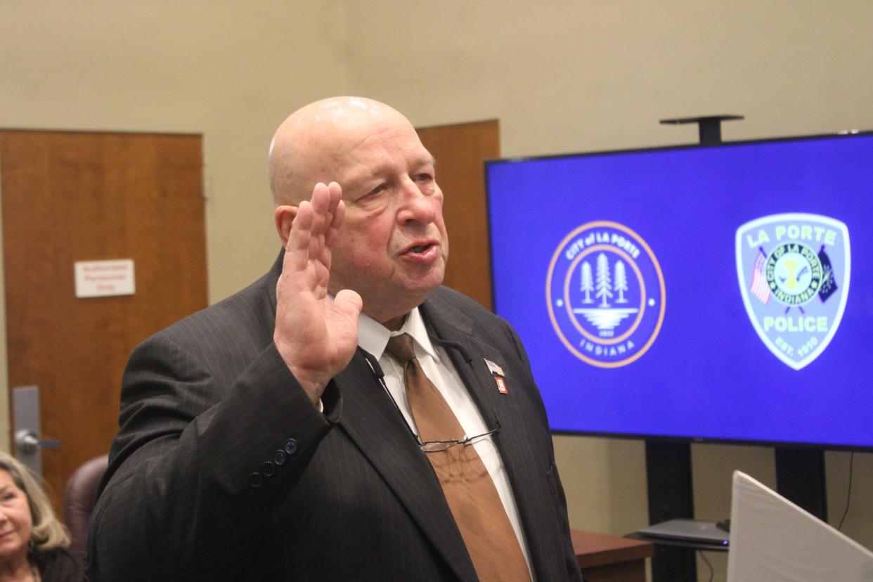 Dick Buell takes his oath Monday, Feb. 5, 2024, during his swearing in ceremony as the new chief of the LaPorte Police Department.