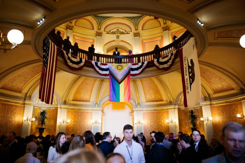 The LGTBQ+ pride flag hangs in the State Capitol rotunda in Sacramento, California on June 30, 2023.