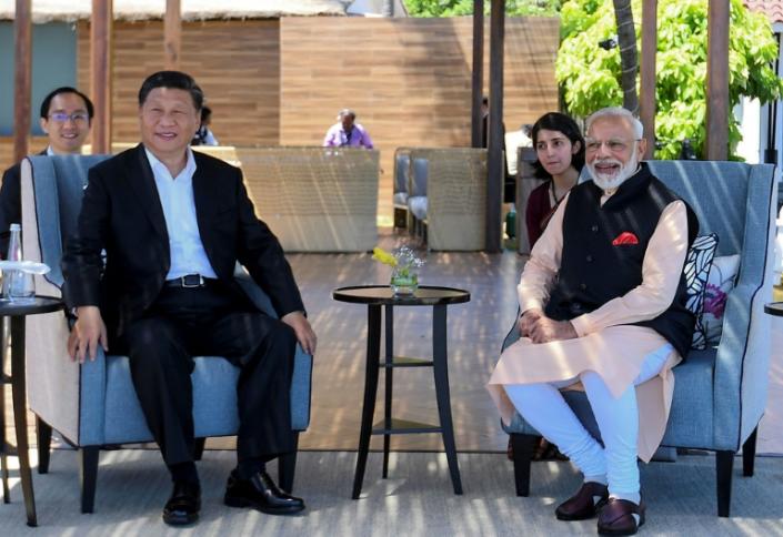 India's Prime Minister Narendra Modi (R) told Chinese President Xi Jinping (L) that their summit would launch a "new era of cooperation" between the world's two largest nations (AFP Photo/Handout)