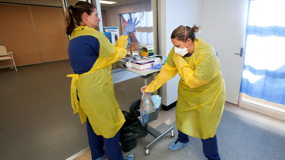 Nurses are seen at a coronavirus clinic in South Australia. Source: AAP