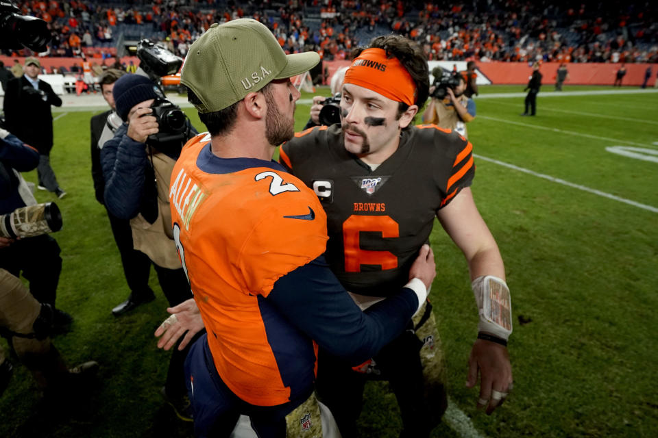 Denver Broncos quarterback Brandon Allen (2) greets Cleveland Browns quarterback Baker Mayfield (6) after an NFL football game, Sunday, Nov. 3, 2019, in Denver. The Broncos won 24-19. (AP Photo/Jack Dempsey)