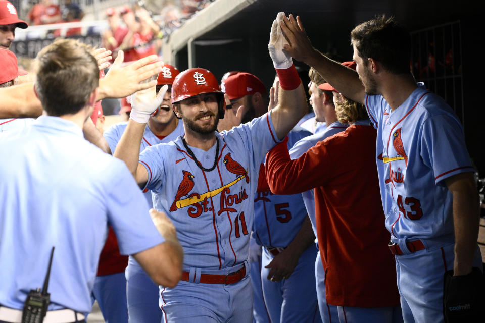 St. Louis Cardinals' Paul DeJong (11) celebrates after his two-run home run during the fifth inning of a baseball game against the Washington Nationals, Saturday, July 30, 2022, in Washington. (AP Photo/Nick Wass)