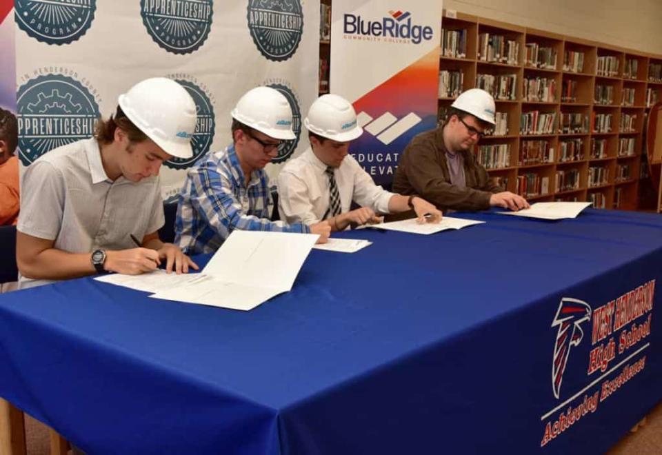 Students from Henderson County Public Schools sign on to be part of the Made in Henderson County Apprenticeship Program in 2019, an advanced manufacturing workforce initiative. (Courtesy of Blue Ridge Community College)