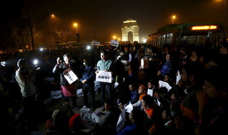 Demonstrators listen to a speaker during a protest against the release of a juvenile rape convict, in New Delhi, India, December 20, 2015. REUTERS/Adnan Abidi