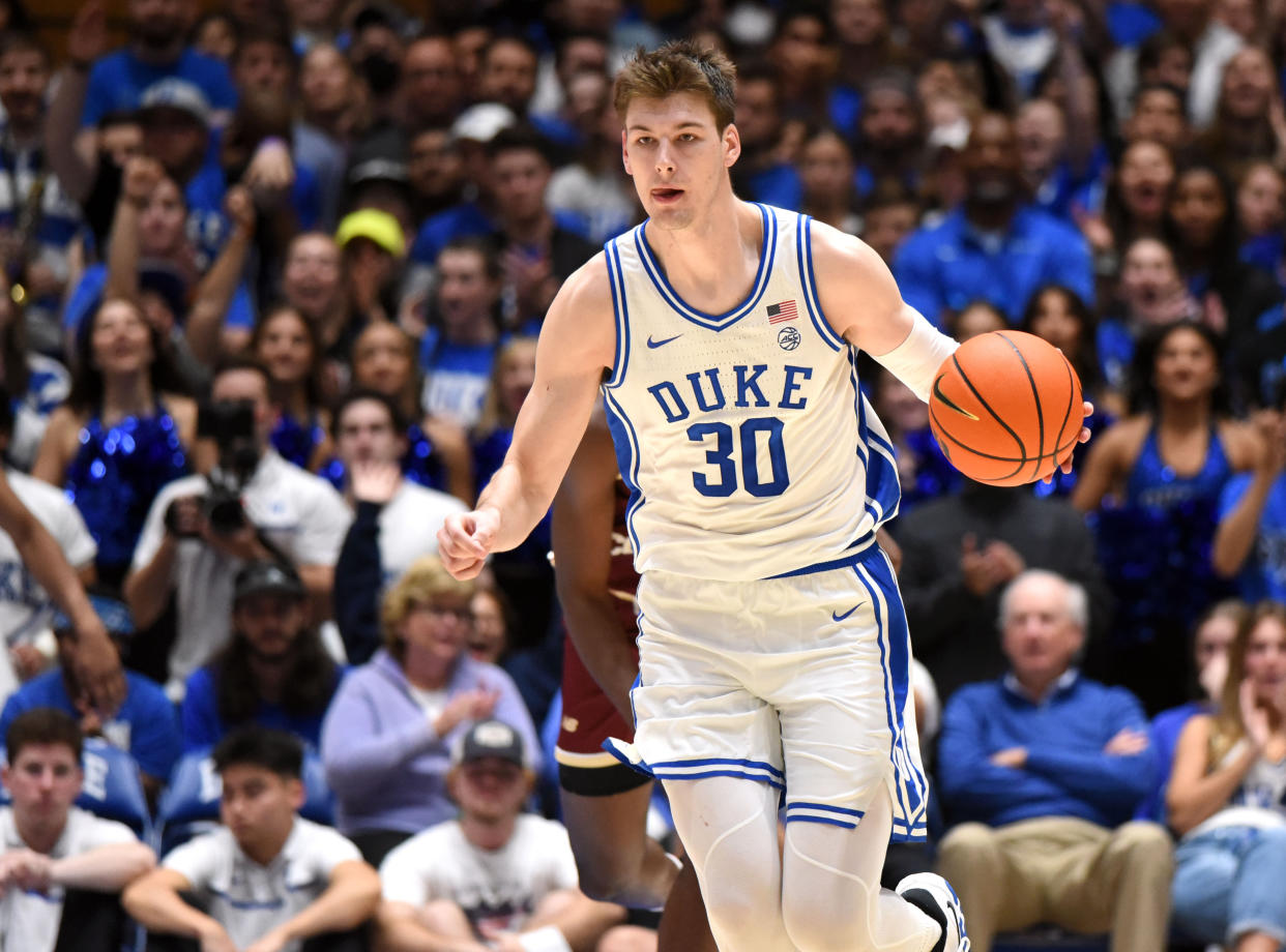 Dec 3, 2022; Durham, North Carolina, USA;Duke Blue Devils center Kyle Filipowski(30) dribbles up court during the second half against teh Boston College Eagles at Cameron Indoor Stadium. Mandatory Credit: Rob Kinnan-USA TODAY Sports