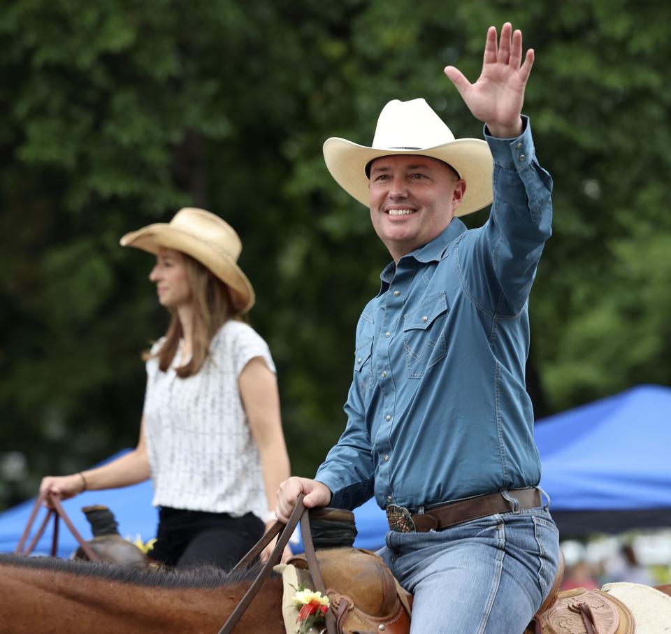 Gov. Spencer J. Cox and first lady Abby Cox ride in the Days of ‘47 Parade in Salt Lake City on Monday, July 24, 2023. | Laura Seitz, Deseret News