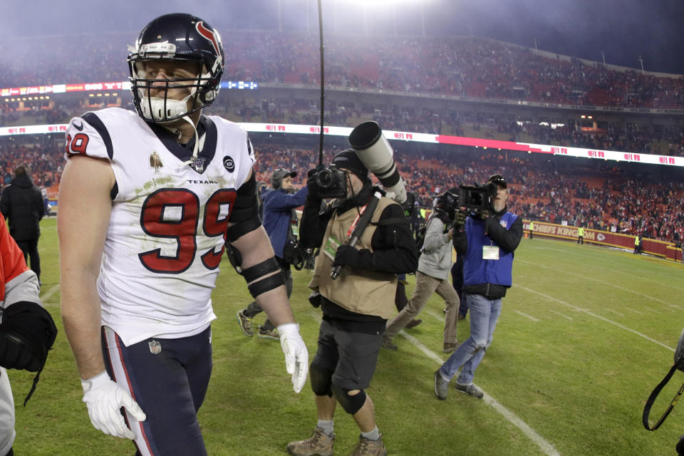 Houston Texans defensive end J.J. Watt (99) walks off the field after an NFL divisional playoff football game against the Kansas City Chiefs, Sunday, Jan. 12, 2020, in Kansas City, Mo. (AP Photo/Charlie Riedel)