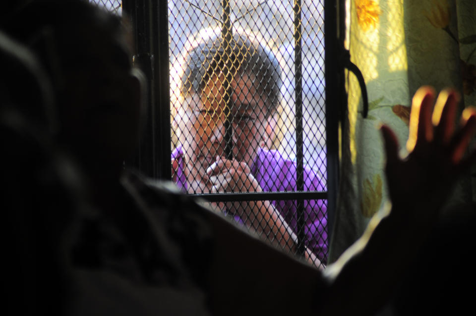 An unidentified person stands at the entrance to the home of the parents of Texas death-row inmate Edgar Tamayo in Miacatlan, Mexico, Wednesday, Jan. 22, 2014. The Mexican national was executed Wednesday night in Texas for killing a Houston police officer, despite pleas and diplomatic pressure from the Mexican government and the U.S. State Department to halt the punishment. Tamayo, 46, received a lethal injection for the January 1994 fatal shooting of Officer Guy Gaddis, 24. (AP Photo/Tony Rivera)