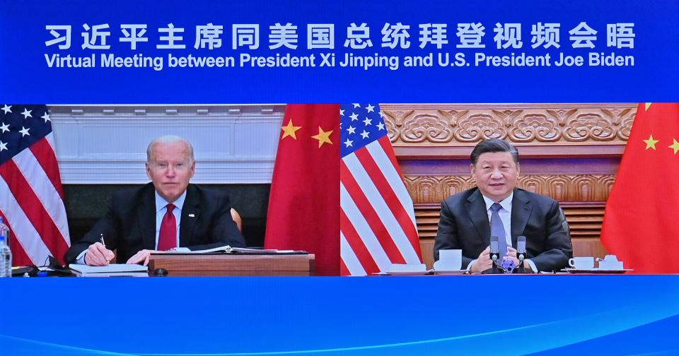 Chinese President Xi Jinping meets with U.S. President Joe Biden via video link, in Beijing, capital of China, Nov. 16, 2021. (Photo by Yue Yuewei/Xinhua via Getty Images)