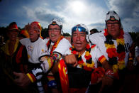 <p>Germany fans get in the mood before the match at Brandenburg Gate </p>