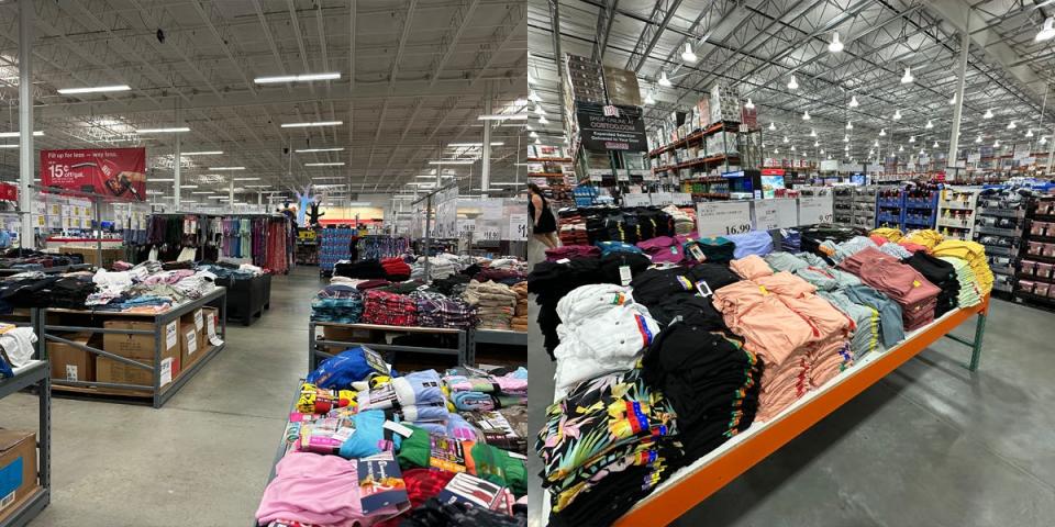 Tables of clothing at BJ's next to table of clothing at Costco