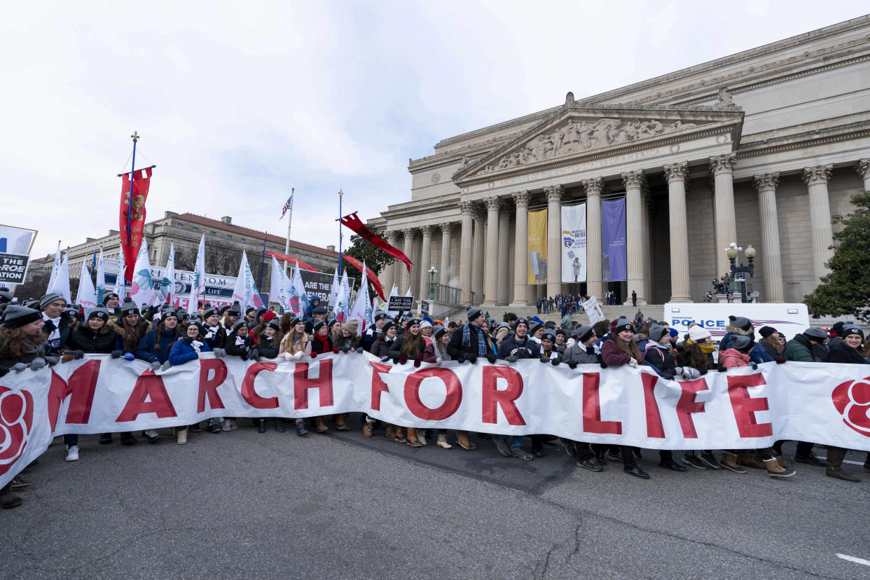 FILE - Anti-abortion activists march towards the U.S. Supreme Court during the March for Life in Washington, Jan. 21, 2022. Anti-abortion activists will have multiple reasons to celebrate – and some reasons for unease -- when they gather Friday, Jan. 20, 2023 in Washington for the annual March for Life. The march has been held since January 1974 – a year after the U.S. Supreme Court’s Roe v. Wade decision established a nationwide right to abortion. (AP Photo/Jose Luis Magana, File)