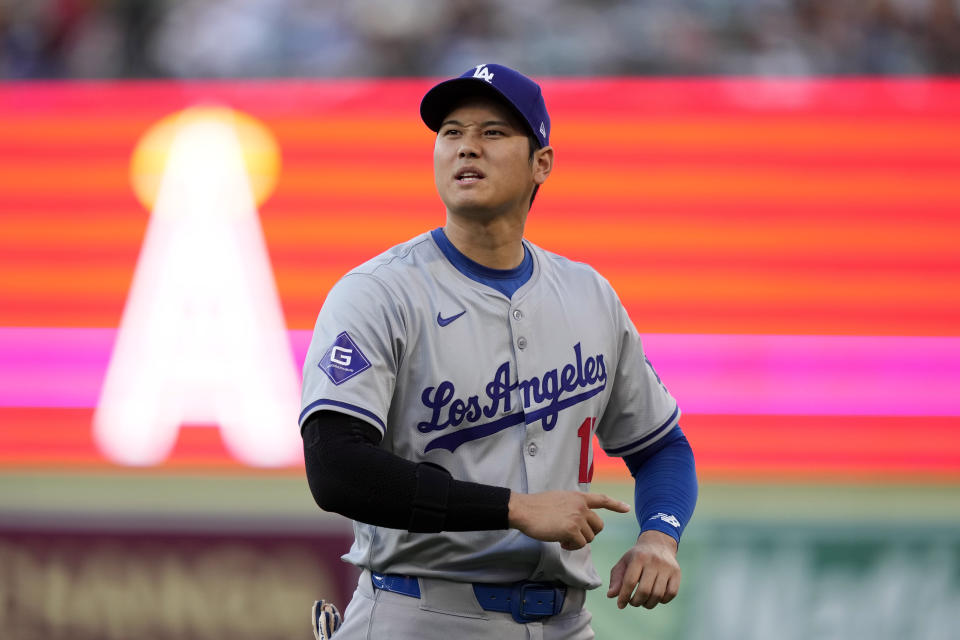 Los Angeles Dodgers' Shohei Ohtani warms up prior to a baseball game against the Los Angeles Angels, Tuesday, Sept. 3, 2024, in Anaheim, Calif. (AP Photo/Mark J. Terrill)