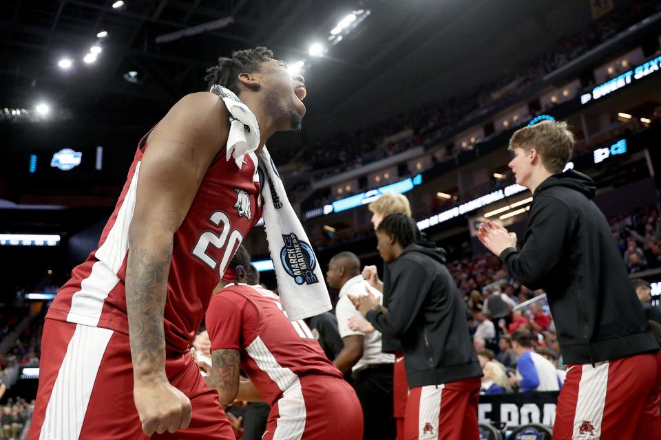 SAN FRANCISCO, CALIFORNIA - MARCH 24: Kamani Johnson #20 of the Arkansas Razorbacks reacts against the Gonzaga Bulldogs during the first half in the Sweet Sixteen round game of the 2022 NCAA Men's Basketball Tournament at Chase Center on March 24, 2022 in San Francisco, California. (Photo by Ezra Shaw/Getty Images)