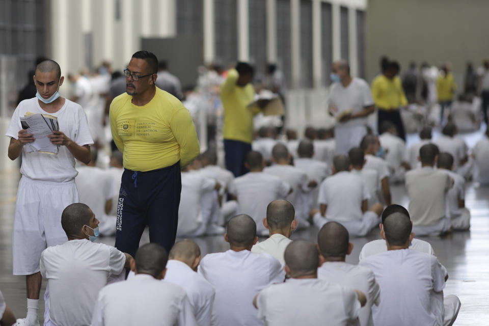 Inmates attend class on social behavior during a press tour of the Terrorism Confinement Center, a mega-prison in Tecololuca, El Salvador, Thursday, Oct. 12, 2023. (AP Photo/Salvador Melendez)