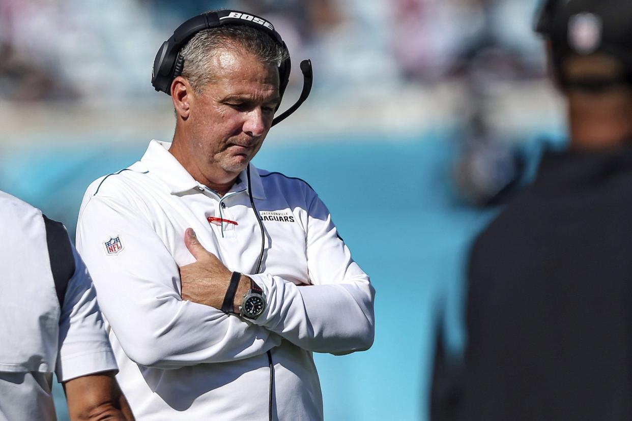 FILE - Jacksonville Jaguars head coach Urban Meyer stands on the sideline during the final minutes of an NFL football game against the Arizona Cardinals, Sunday, Sept. 26, 2021, in Jacksonville, Fla. Urban Meyer's tumultuous NFL tenure ended after just 13 games â€” and two victories â€” when the Jacksonville Jaguars fired him early Thursday, Dec. 16, 2021 because of an accumulation of missteps.(AP Photo/Gary McCullough, File)