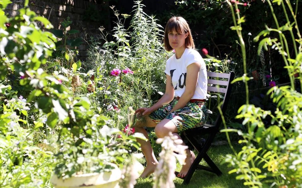 Writer and gardening columnist Alice Vincent, photographed in her garden in Brixton - Clara Molden for The Telegraph