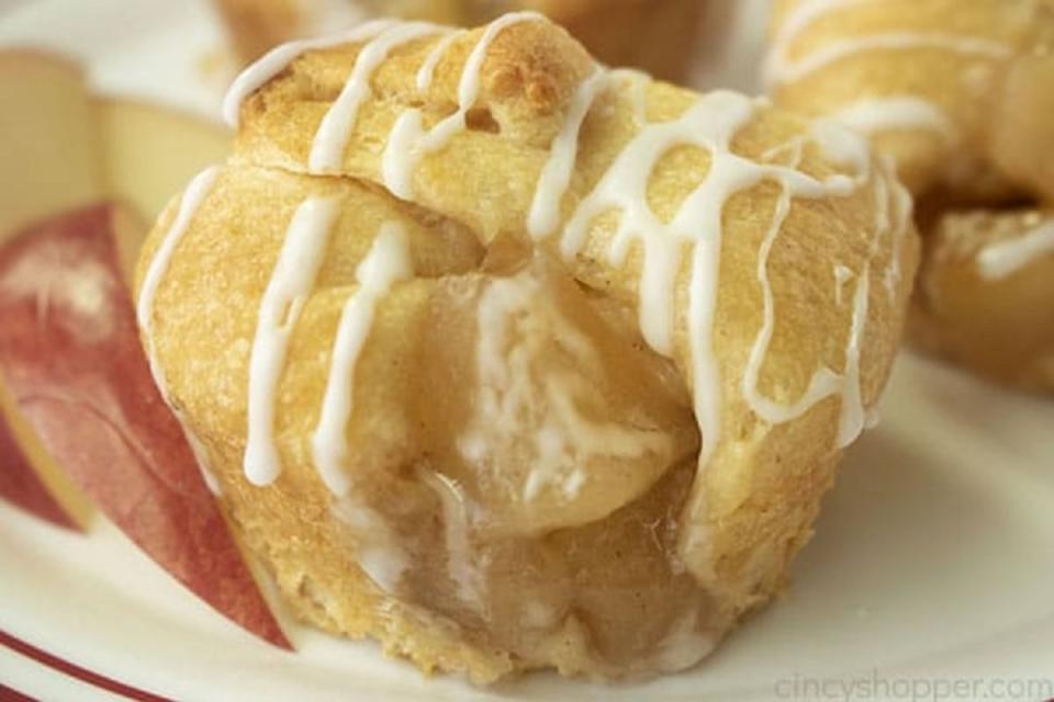 <p>Cincy Shopper</p><p>Use Pillsbury Crescent Rolls and fill with apple pie filling to make these muffin-sized delicious pies.</p><p><strong>Get the recipe: <a href="https://cincyshopper.com/apple-pie-bites/" rel="nofollow noopener" target="_blank" data-ylk="slk:Apple Pie Bites;elm:context_link;itc:0;sec:content-canvas" class="link ">Apple Pie Bites</a></strong></p>