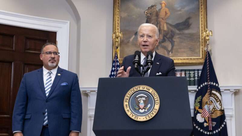 Joe Biden and Miguel Cardona