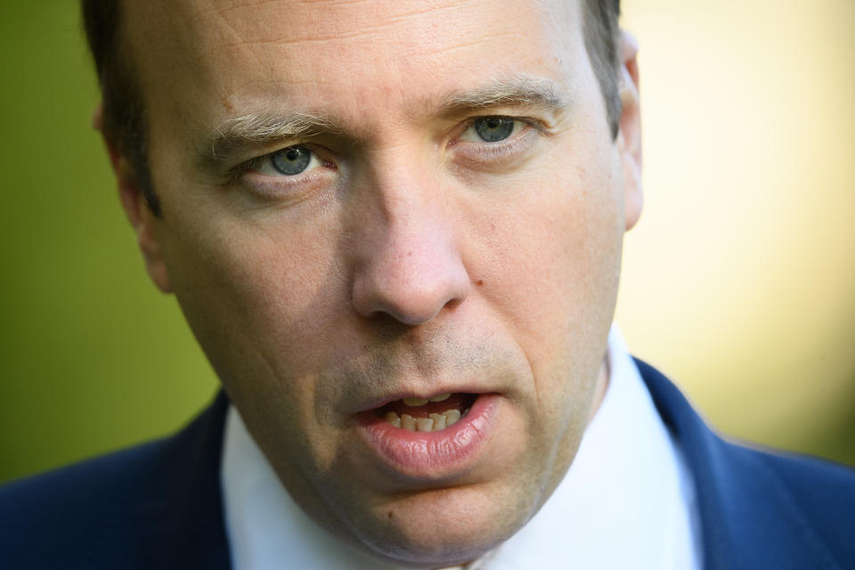 LONDON, ENGLAND - SEPTEMBER 24: Health Secretary Matt Hancock speaks to a media crew near the Houses of Parliament on September 24, 2020 in London, England. As Coronavirus cases continue to rise in the UK, earlier this week the British Prime Minister announced new measures to help curb the spread of the virus.  These include shop assistants, taxi drivers and waiting staff to wear masks, pubs and restaurants to close at 10pm and only offer table service. Further restrictions on sporting events were also announced. (Photo by Leon Neal/Getty Images)