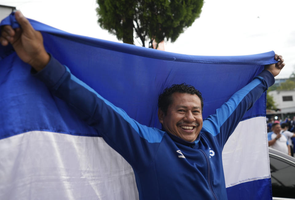 An El Salvador fan cheers prior a qualifying soccer match against United States for the FIFA World Cup Qatar 2022 at Cuscatlan stadium in San Salvador, El Salvador, Thursday, Sept. 2, 2021. (AP Photo/Moises Castillo)