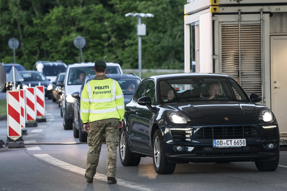 Vehicles queue at the border crossing in Krusaa, Denmark, after the country reopened its borders to Germany Monday, June 15, 2020, following the new coronavirus pandemic. (Claus Fisker/Ritzau Scanpix via AP)