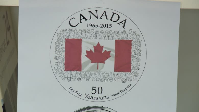 Kentville artist Bonnie Ross behind Canadian flag coin