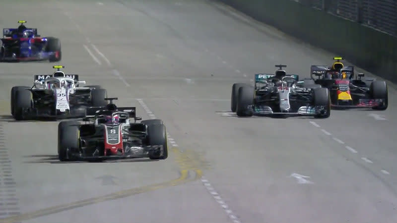 Max Verstappen (R) got out of the way as backmarkers offered him a chance to pass Lewis Hamilton. Pic: F1