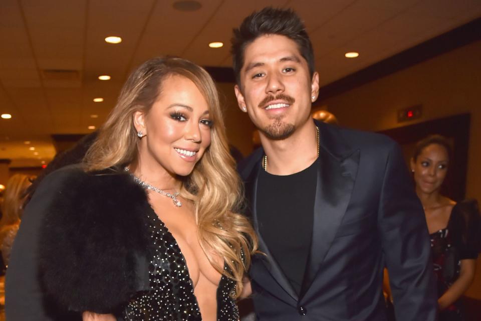 <p>Kevin Mazur/Getty</p> Mariah Carey and Bryan Tanaka