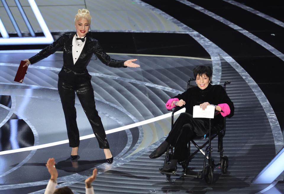 (L-R) Lady Gaga and Liza Minnelli speak onstage during the 94th annual Academy Awards.