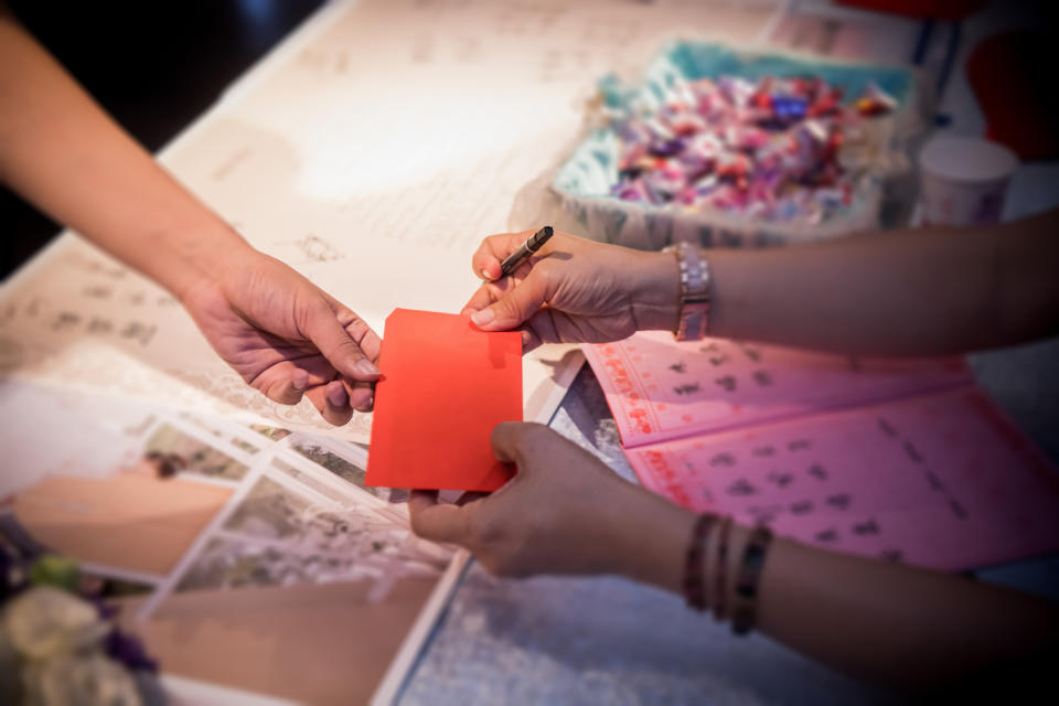 Red envelope blessing at the wedding