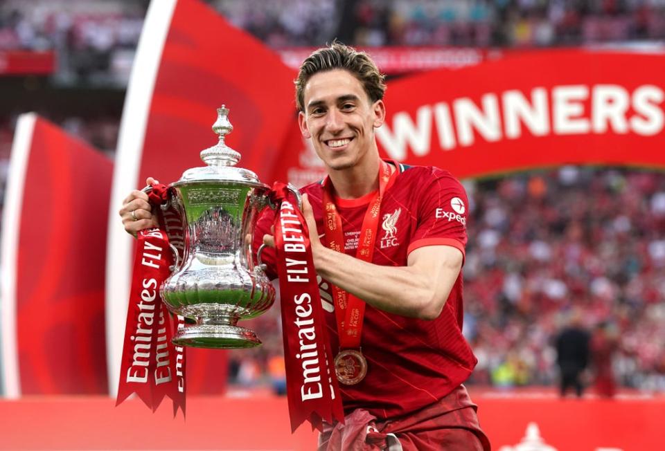 Liverpool’s Kostas Tsimikas poses with the trophy after winning the FA Cup at Wembley (Nick Potts/PA) (PA Wire)