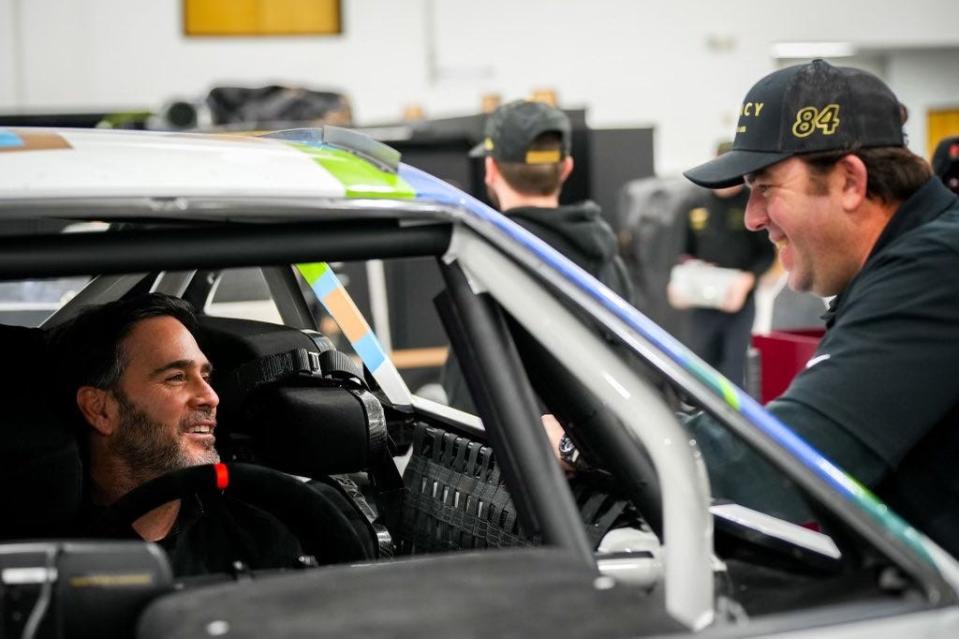 Seven-time NASCAR Cup Series champion Jimmie Johnson, left, shares a laugh with his new crew chief, Jason Burdett. Legacy Motor Club announced Tuesday that Burdett, an Arkport native, will lead Johnson's race team in 2024.