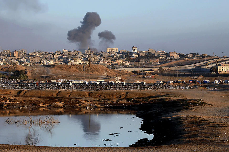 Smoke rises following an Israeli airstrike on buildings near the separating wall between Egypt and Rafah, southern Gaza Strip, Monday, May 6, 2024. (AP Photo/Ramez Habboub)