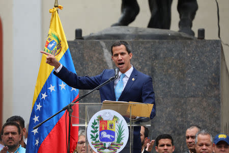 Venezuelan opposition leader Juan Guaido, who many nations have recognised as the country's rightful interim ruler, takes part in a gathering with supporters in Caracas, Venezuela, April 19, 2019. REUTERS/Manaure Quintero