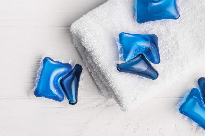 Detergent washing pods and clean bath towel