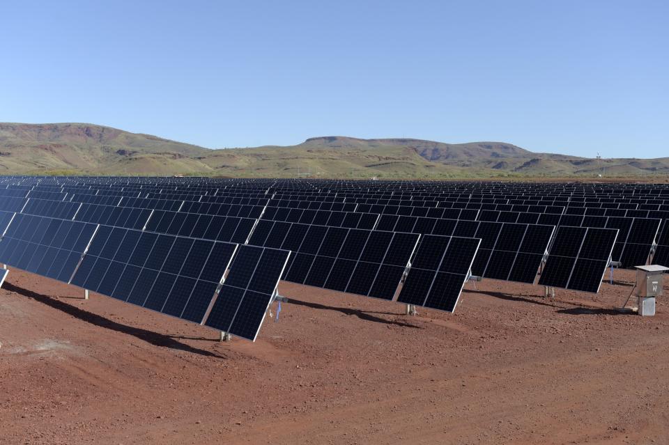 Solar panels at the Gudai-Darri mine operated by the Rio Tinto Group in the Pilbara region of Western Australia, Australia, on Tuesday, June 21, 2022. Gudai-Darri, with an annual capacity of 43 million tons, is expected to increase iron ore production volumes and improve product mix from the Pilbara from the second half of this year, according to a company statement. (Carla Gottgens/Bloomberg)