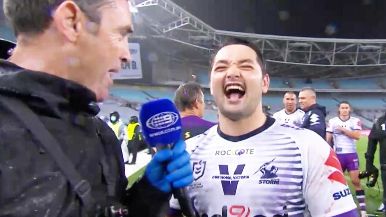 Brandon Smith (pictured right) laughing during a post-match interview with Brad Fittler (pictured left).