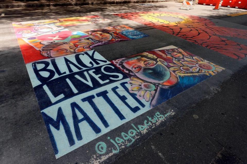 Detail shots of the Black Lives Matter mural painted on the 200-block of South Tryon Street on Friday, July 10, 2020.