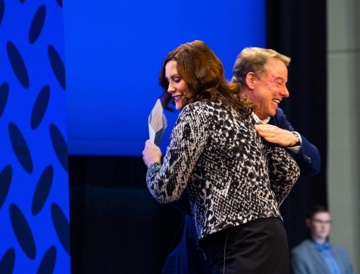 Michigan Governor Gretchen Whitmer is introduced on stage by Ford Motor Company Executive Chairman Bill Ford before speaking about the BlueOval Battery Park Michigan to be built in Marshall during a press announcement at Ford Ion Park in Romulus on Monday, February 13, 2023. 