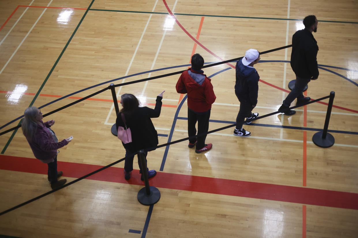 Voters at a recreation center in Norcross, Ga., wait to cast their ballots. 