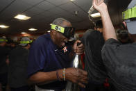 Houston Astros manager Dusty Baker Jr. celebrates in the locker room after their 4-1 World Series win against the Philadelphia Phillies in Game 6 on Saturday, Nov. 5, 2022, in Houston. (AP Photo/David J. Phillip)