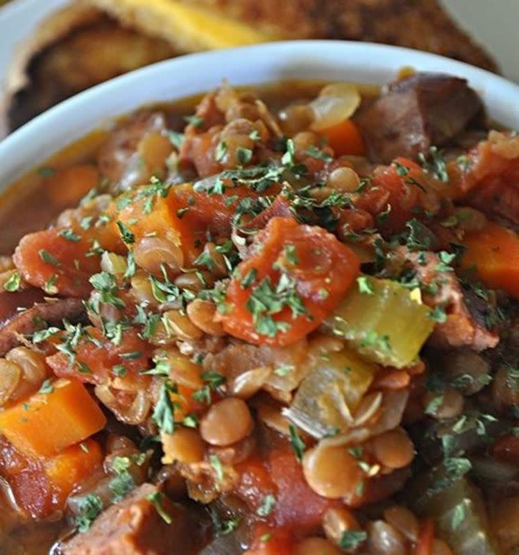 <p>Krista Marshall</p><p>This hearty, filling slow cooker meal is just what you want on a cold day.</p><p><strong>Get the recipe: <a href="https://parade.com/842480/kristamarshall/crock-pot-sausage-lentil-stew/" rel="nofollow noopener" target="_blank" data-ylk="slk:Crock Pot Sausage and Lentil Stew;elm:context_link;itc:0;sec:content-canvas" class="link ">Crock Pot Sausage and Lentil Stew</a></strong></p>