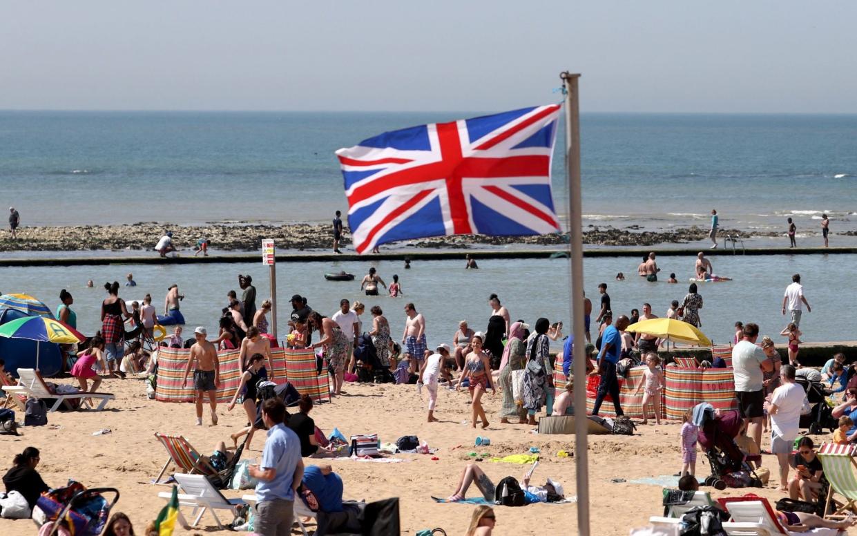 People enjoy the beach in Margate, Kent, on Tuesday - Gareth Fuller /PA