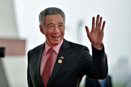 FILE PHOTO: Singapore's Prime Minister Lee Hsien Loong arrives at the Hangzhou Exhibition Center to participate in the G20 Summit, in Hangzhou, Zhejiang province, China, September 4, 2016. REUTERS/Etienne Oliveau/File Photo