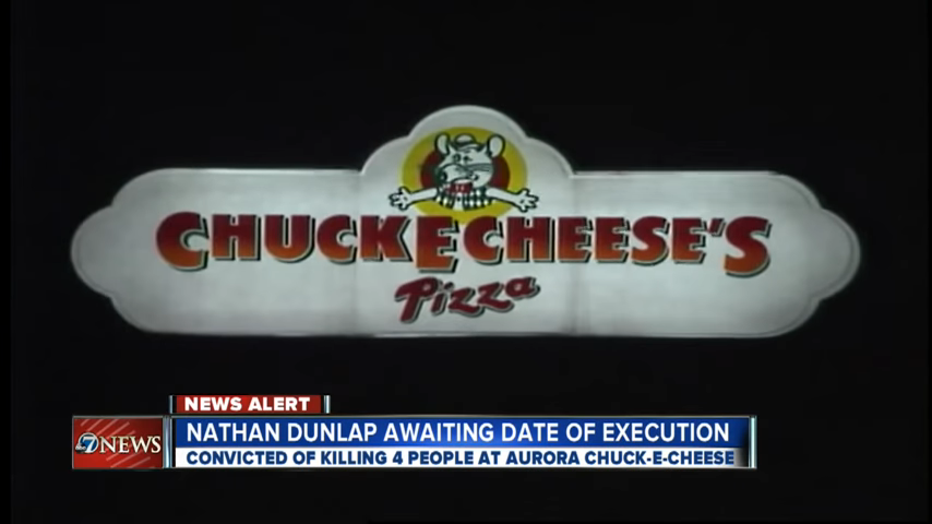 News alert on TV screen about Nathan Dunlap's pending execution date for a crime at a Chuck E. Cheese restaurant