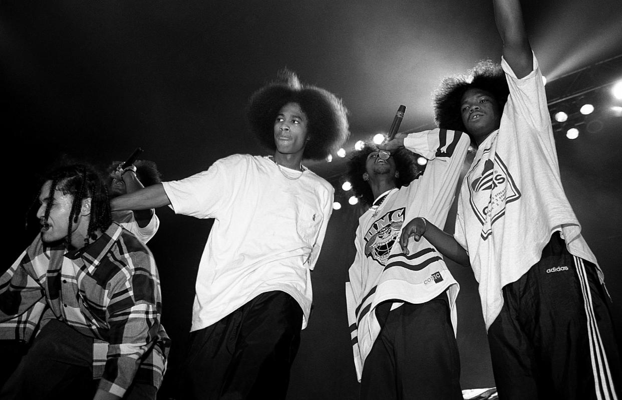 Rappers Bizzy Bone, Layzie Bone, Krayzie Bone and Wish Bone of Bone Thugs-N-Harmony performs at the International Amphitheatre in Chicago, Illinois in April 1995.