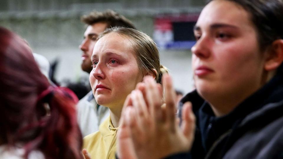 PHOTO: An attendee cries as family members of the victims speak to the crowd during a vigil at the University of Idaho for four students found dead in their residence on Nov. 13 in Moscow, Idaho, Nov. 30, 2022. (Lindsey Wasson/Reuters)